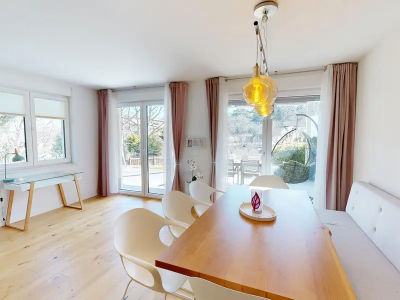 Premium Gartenwohnung in einem Zweiparteienhaus (Haushälfte) mit Terrasse & eigenem Parkplatz