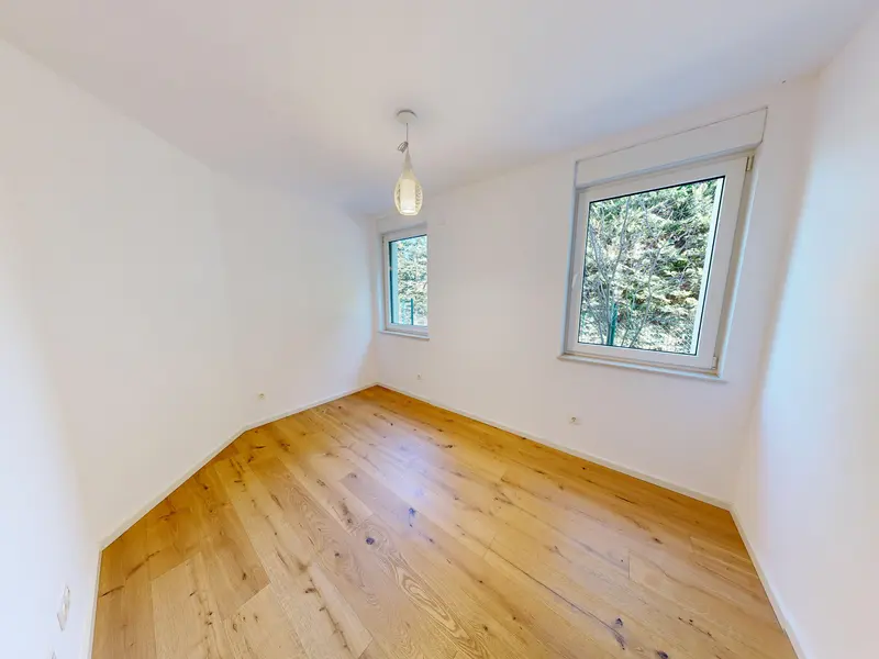 Premium Gartenwohnung in einem Zweiparteienhaus (Haushälfte) mit Terrasse & eigenem Parkplatz