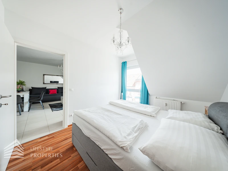 3,9% Rendite! Verpachtetes Apartmenthaus mit 16 Apartments und 2 Geschäftslokalen, Nähe Flughafen Wien